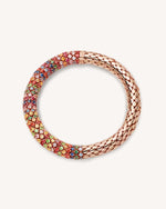 18k yellow and rose polished gold 180 mix twister luxe bracelet with pavé rainbow precious stones on white background