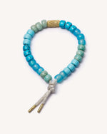 Hydra forte beads bracelet with moon lurex cord and 18k yellow gold caps with Fgl Occhio bead