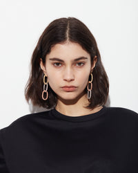 18k yellow, white and rose florentine frosted finish gold 1885 grande links earrings styled on model