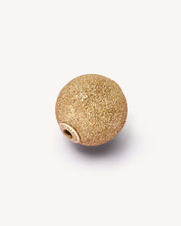 18k yellow gold florentine frosted finish sphere on white background