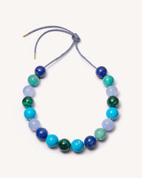 East village downtown necklace including Lapis lazuli, amazonite, Chalcedony and Malachite semi precious spheres, with sky coloured enamel spheres