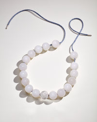 Flatiron Downtown Necklace including white agate semi precious spheres, and 18k white gold florentine finish sphere