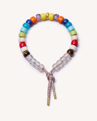 Maldives forte bead bracelet and heather pink lurex cord with 18k yellow gold caps and 18k yellow gold bead