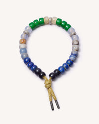 Montauk forte beads bracelet with sun lurex cord with 18k black gold caps and 3 18k white gold beads