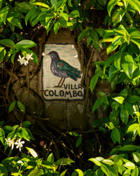 Villa colombo sign immersed in leafy environment