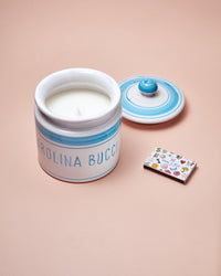 Villa colombo candle with lucky matchbox on a rose background