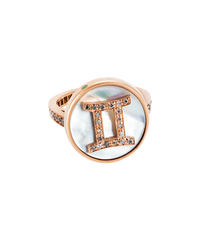 18k pink gold gemini zodiac ring with grey pave diamonds on a mother of pearl medallion on a white background