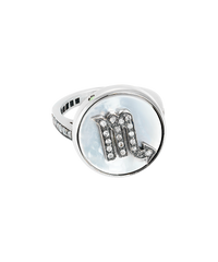 18k white gold scorpio zodiac ring with grey pave diamonds on a mother of pearl medallion on a white background