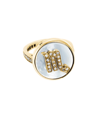 18k yellow gold scorpio zodiac ring with grey pave diamonds on a mother of pearl medallion on a white background