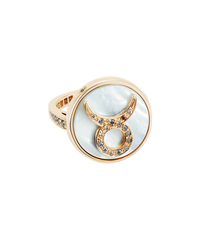 18k yellow gold taurus zodiac ring with grey pave diamonds on a mother of pearl medallion on a white background