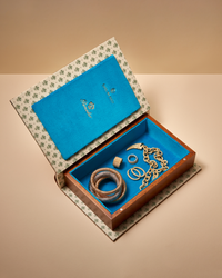 pineider safe book with 18k gold kiss bracelets, cuff ring, thick rings, oval earrings and 1885 necklace